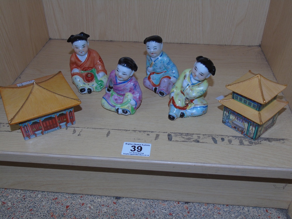 4 ORIENTAL CERAMIC FIGURES & 2 MUSICAL BOXES IN THE FORM OF PAGODAS