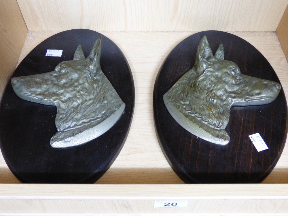 2 MOUNTED METAL DOGS HEADS ON WOODEN WALL PLAQUES