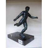 BRONZED FIGURE OF A FOOTBALLER ON A MARBLE BASE 27 CMS HIGH
