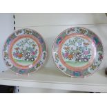 PAIR OF 20TH CENTURY FAMILLE ROSE PLATES 31 CMS