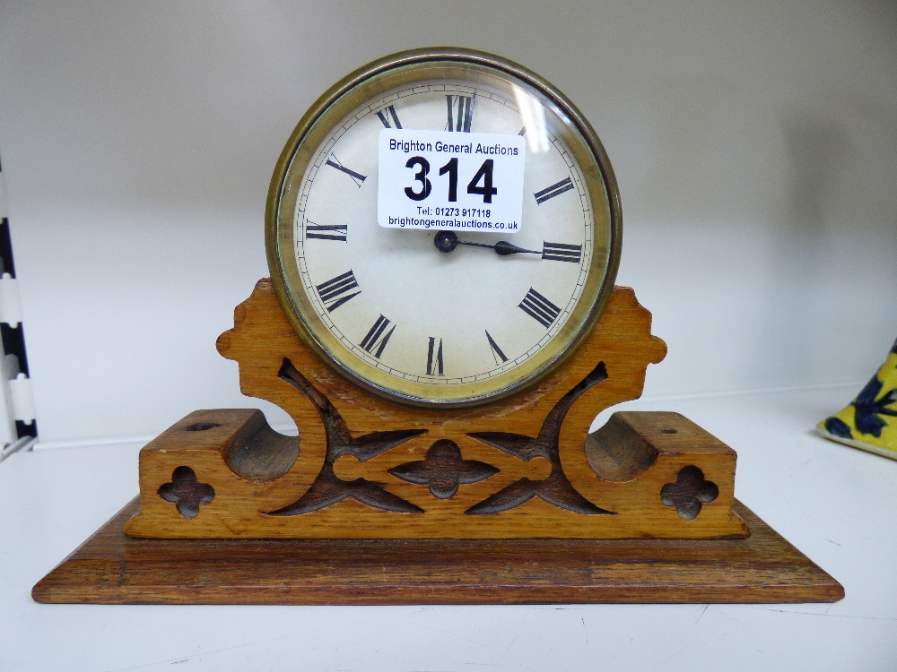 BRASS DRUM CASED CARRIAGE CLOCK MOUNTED ON A LATER OAK BASE