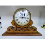 BRASS DRUM CASED CARRIAGE CLOCK MOUNTED ON A LATER OAK BASE