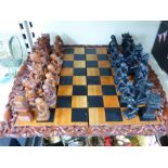 FOLDING WOODEN CHESS BOARD & HAND CARVED PIECES