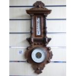 BAROMETER / THERMOMETER IN CARVED WOODEN CASE
