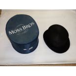 TOP HAT BY MOSS BROS. IN ADVERTISING CASE