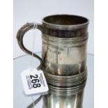 HALL MARKED SILVER MUG 8.5 CMS HIGH 202.64 GRAMS. INSCRIPTION READS, MICHAEL HAMILTON STURT, JULY