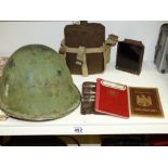 QUANTITY OF MILITARY ITEMS INCLUDING METAL HELMET, WATER BOTTLE & 2 GERMAN ID BOOKS