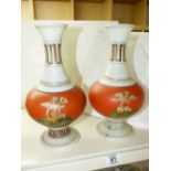 PAIR OF GLASS VASES WITH GREEK KEY & PUTTI DESIGN, A/F