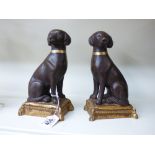 PAIR OF ANTIQUE STYLE SEATED CHOCOLATE LABRADORS