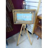 SIGNED PAINTING OF A BEACH SCENE + WOODEN ARTISTS EASEL. 58 X 37 CMS