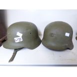 2 X GERMAN MILITARY HELMETS WITH LINERS