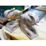 PAIR OF BOOKENDS IN THE SHAPE OF SEATED ELEPHANTS