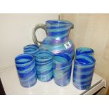 MEXICAN ART GLASS SIX BEAKER & JUG SET