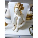 SEATED CERAMIC FIGURE