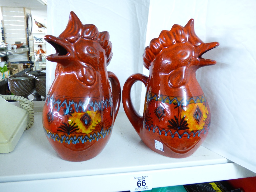 A PAIR OF CERAMIC JUGS IN THE FORM OF CHICKENS