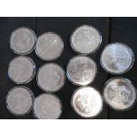 USA X 11 one ounce silver bullion eagles F D C and encapsulated No certs