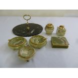 A quantity of onyx table lighters, ashtrays and cigarette box and a marble sandwich plate