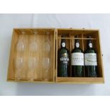 A cased set of Fonseca Port to include three bottles and six glasses