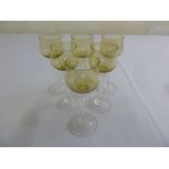 A set of six early 20th century wine glasses with hexagonal twist stem