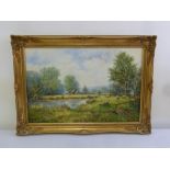 Gordon Lindsay framed oil on canvas of a country landscape, signed bottom left, 49.5 x 74.5cm