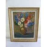 A framed oil on panel still life of flowers, 59 x 46.5cm