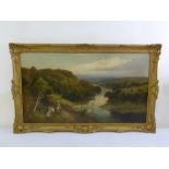 A late 19th century framed oil on canvas of figures in a landscape by a river, signed bottom left,