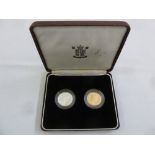 A two coin proof set in fitted case to include a Sovereign and a silver one pound dated 1996