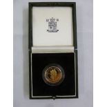 A gold £2 proof coin in fitted case