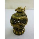 A Chinese bronze incense burner in the form of a dragon