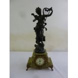 A late 19th French century spelter clock, surmounted by a classical figure playing a lyre on