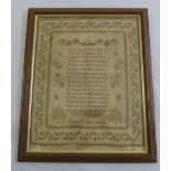 A framed and glazed sampler dated 1812, 41 x 33cm