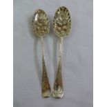 A pair of silver berry spoons of customary form