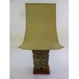 A brass table lamp in the Chinese style with silk shade