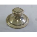 A silver capstan inkwell of customary form, London 1912