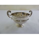 A silver two handled trophy cup on raised circular base, Birmingham 1915