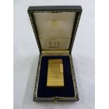 Dunhill gold plated cigarette lighter in original fitted case