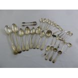 A quantity of antique and modern mixed pattern silver flatware to include basting spoons, table