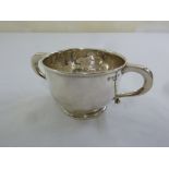 A silver porringer, circular with scroll side handles, Birmingham 1939