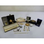 A quantity of costume jewellery to include necklaces, bracelet, brooches and wristwatches