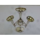 A silver baluster shaped centre piece on circular base with three detachable trumpet vases,