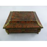 A 19th century French Boulle jewellery casket of shaped rectangular form with Ormolu mounts and