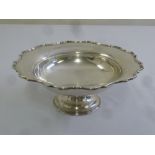 A silver shaped circular fruit bowl on raised circular base, Chester 1906