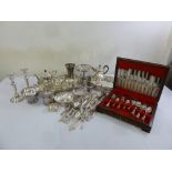 A quantity of silver plate to include trays, teasets, dishes and a canteen of flatware in fitted