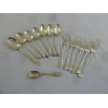 A set of six silver Old English pattern dessert spoons, Sheffield 1904, five silver dessert forks