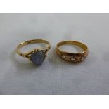 Two gold rings set with various stones, tested 15ct, approx total weight 5.1g