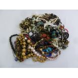 A quantity of costume jewellery to include necklaces and bangles