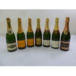 Seven 75cl bottles of champagne to include Tattinger 1989, Veuve Clicquot Ponsardin, Bollinger