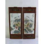 A pair of Chinese Republic period rectangular hand painted porcelain panels decorated with