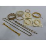 A quantity of gold plated and silver bracelets and bangles and a silver necklace (11)