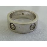 18ct white gold and diamond Cartier style ring, approx 10.1g